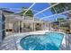 Backyard with a screened-in lanai, pool, and plenty of seating at 115 Oak Grove Cir, Lake Mary, FL 32746