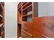Walk-in closet featuring wood shelving and drawer storage at 11508 Delwick Dr, Windermere, FL 34786