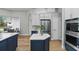 Beautiful kitchen with a center island, stainless steel appliances, and plenty of cabinet space at 11508 Delwick Dr, Windermere, FL 34786