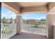 Relaxing balcony with white railings overlooking landscaped neighborhood at 1204 Lexington Ave, Davenport, FL 33837