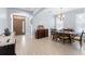 Formal dining room featuring tile flooring, wooden furniture, a chandelier, and a view of the entryway at 1204 Lexington Ave, Davenport, FL 33837