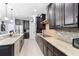 A kitchen features granite countertops, modern appliances, and ample cabinet space at 1204 Lexington Ave, Davenport, FL 33837