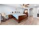 This main bedroom has hard wood floors and lots of natural light at 1204 Lexington Ave, Davenport, FL 33837