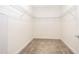 Walk-in closet with wire shelving and carpet flooring at 1227 Sandwedge St, Davenport, FL 33896