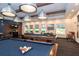 A recreation room featuring billiards and comfortable seating at 1227 Sandwedge St, Davenport, FL 33896