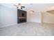 Cozy living room featuring tile floors, modern design elements, and ceiling fans at 1227 Sandwedge St, Davenport, FL 33896