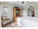 Well-lit bedroom with a flat-screen television, closet and access to the ensuite bathroom at 1370 Centre Court Ridge Dr # 204, Reunion, FL 34747