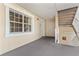 Exterior entryway featuring stairs and white door with window on the side at 1370 Centre Court Ridge Dr # 204, Reunion, FL 34747