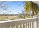 Scenic view of the golf course from the balcony, surrounded by lush landscaping and vibrant trees at 1370 Centre Court Ridge Dr # 204, Reunion, FL 34747
