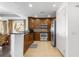 Well-equipped kitchen with stainless steel appliances and wooden cabinetry at 1370 Centre Court Ridge Dr # 204, Reunion, FL 34747