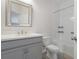 Clean bathroom with gray vanity, white countertop, large mirror, and tiled shower-tub combo in a well-lit space at 141 Mitchell Creek Way, Oviedo, FL 32765