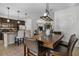 Open concept eat-in kitchen and dining room with lots of seating for the whole Gathering at 14131 Lakeview Park Rd, Winter Garden, FL 34787