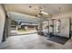 Garage features storage cabinets and a view to the home's exterior at 14131 Lakeview Park Rd, Winter Garden, FL 34787