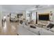 Bright, open-concept living space with tile floors, and ceiling fan at 14131 Lakeview Park Rd, Winter Garden, FL 34787