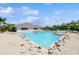 An expansive outdoor community pool offers a refreshing escape with nearby amenities at 14208 Morning Frost Dr, Orlando, FL 32828