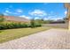 The large backyard has a paver patio for outdoor dining and enjoying the manicured lawn at 1504 Oak Marsh Loop, Davenport, FL 33837