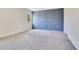 This bedroom has a wall with a unique modern design and a large window for natural light at 1504 Oak Marsh Loop, Davenport, FL 33837
