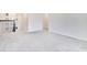 Second floor hallway with carpeting and black metal railing at 1504 Oak Marsh Loop, Davenport, FL 33837