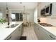 Modern kitchen featuring sleek countertops, stainless steel appliances, and stylish decor at 15849 Sweet Lemon Way, Winter Garden, FL 34787