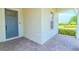 Inviting front porch with stone pavers leading to a stylish front door at 1598 Whitewood Ct, Kissimmee, FL 34747