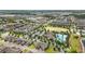 Community aerial view showcasing the community pool, clubhouse, ponds, and well-maintained landscaping at 16163 Pebble Bluff Loop, Winter Garden, FL 34787