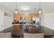Well-equipped kitchen with granite countertops, stainless steel appliances, and ample cabinet space at 16163 Pebble Bluff Loop, Winter Garden, FL 34787
