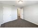 Cozy bedroom with carpet flooring and a view of the ensuite bathroom at 16518 Brook Springs Aly, Winter Garden, FL 34787