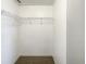 Walk-in closet with carpeted floor and wire shelving for organized storage at 16518 Brook Springs Aly, Winter Garden, FL 34787