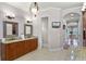 Elegant bathroom with dual vanities, custom cabinetry, and a sleek design throughout at 1724 Cottonwood Creek Pl, Lake Mary, FL 32746