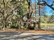 Serene gazebo located by the lake, offering a peaceful retreat surrounded by nature and lush greenery at 1724 Cottonwood Creek Pl, Lake Mary, FL 32746