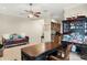 Well-appointed office featuring built-ins, a large desk, and cozy seating perfect for work or relaxation at 1724 Cottonwood Creek Pl, Lake Mary, FL 32746