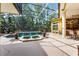 Screened in pool area featuring a pool, spa, patio, and mature landscaping at 1724 Cottonwood Creek Pl, Lake Mary, FL 32746