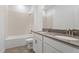 Modern bathroom featuring a shower-tub combo with vanity at 1757 Brush Cherry Pl, Ocoee, FL 34761