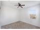 Bedroom features carpet, a ceiling fan, a window, and neutral walls at 1757 Brush Cherry Pl, Ocoee, FL 34761