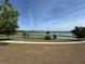 Picturesque community park with walking path and scenic waterfront views, ideal for leisure and recreation at 1757 Brush Cherry Pl, Ocoee, FL 34761