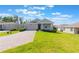 Beautiful single-Gathering home with a well-maintained lawn and brick paved driveway at 1757 Brush Cherry Pl, Ocoee, FL 34761