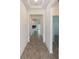 Inviting foyer showcasing stylish flooring and access to various rooms at 1757 Brush Cherry Pl, Ocoee, FL 34761