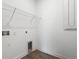 Laundry room with hookups and shelves at 1757 Brush Cherry Pl, Ocoee, FL 34761