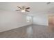Spacious living room featuring tile floors and an abundance of natural light at 1757 Brush Cherry Pl, Ocoee, FL 34761