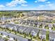 New construction community featuring sidewalks and green space with stunning home exteriors and picturesque water views at 17847 Adrift Rd, Winter Garden, FL 34787