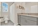 This bathroom boasts modern fixtures, granite counters, and a shower/tub combo at 17847 Adrift Rd, Winter Garden, FL 34787