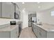 Well-equipped kitchen with granite countertops, stainless steel appliances, and ample cabinet space at 17847 Adrift Rd, Winter Garden, FL 34787