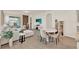 Open living space with tile flooring, dining area, and seamless access to the kitchen at 17847 Adrift Rd, Winter Garden, FL 34787