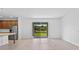 Spacious living room with tile floors and sliding glass doors at 2055 Town Pasture Dr, Eustis, FL 32726