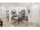 Open dining space adjacent to kitchen, featuring modern lighting and neutral decor at 206 E South St # 3008, Orlando, FL 32801