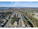 An aerial shot features the homes in a waterfront community with scenic views at 207 Black Springs Ln, Winter Garden, FL 34787
