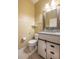 Bathroom featuring modern vanity with granite countertop and white toilet at 207 Black Springs Ln, Winter Garden, FL 34787