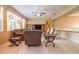 Comfortable living room with tile floors, modern lighting, and a cozy seating area at 207 Black Springs Ln, Winter Garden, FL 34787