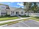 Beautiful single-story home with lush green lawn, offering curb appeal at 2112 Cypress Bay Blvd, Kissimmee, FL 34743