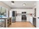 Well-lit kitchen with modern appliances and ample counter space at 2112 Cypress Bay Blvd, Kissimmee, FL 34743